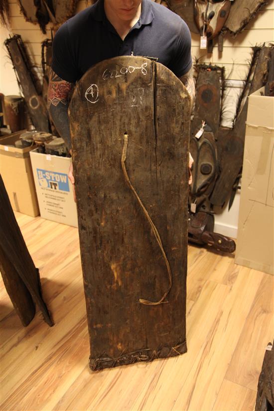 Two Sepik River tree bark shields, hardwood shield & board